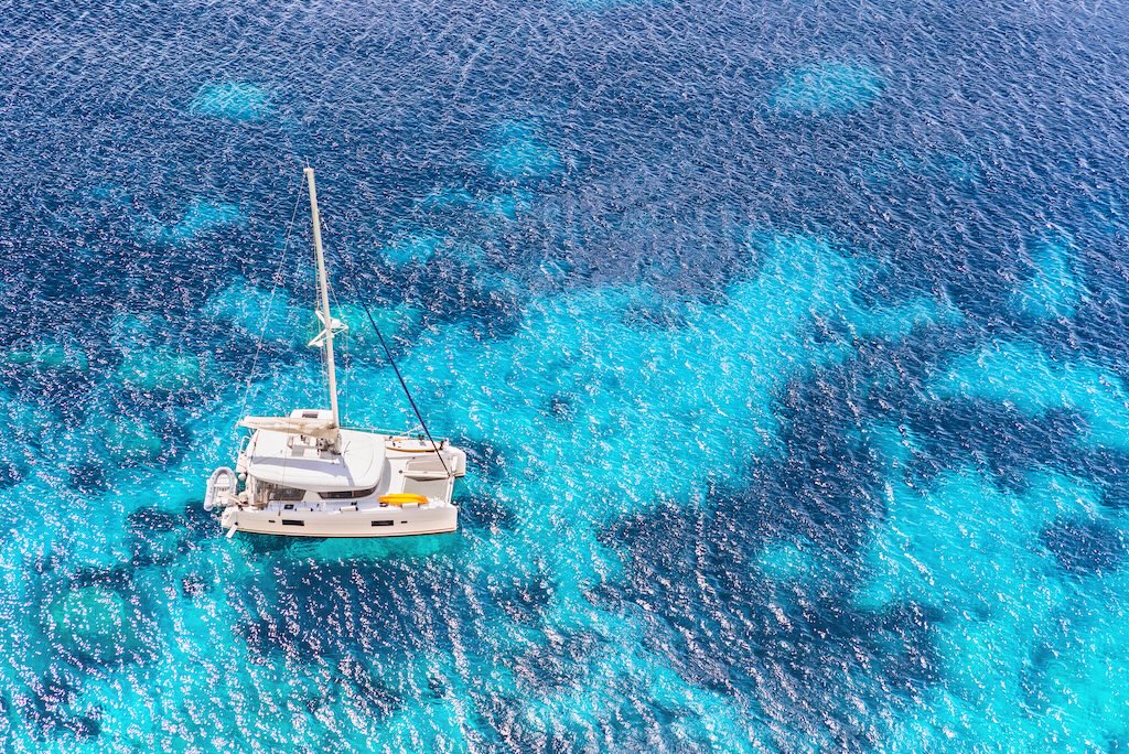 sailing boat in a sea, yachting, sailing, travel and active lifestyle concept